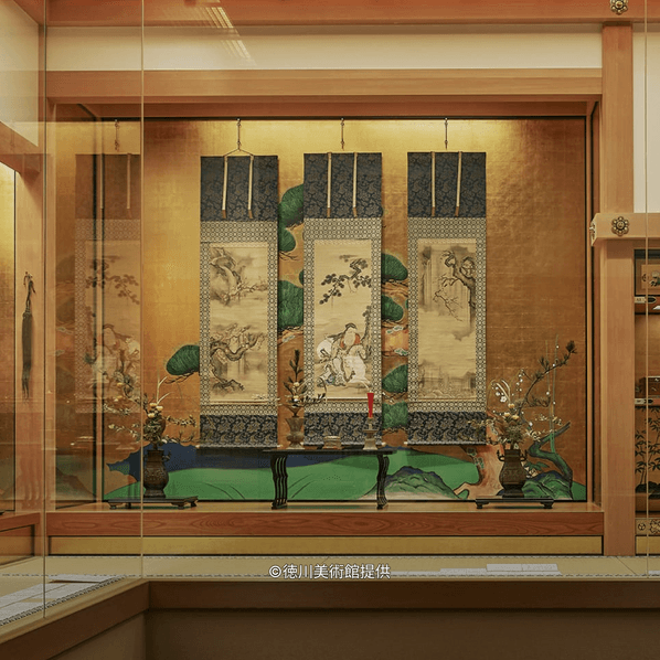 Museum exhibit at the Tokugawa Art Museum, showcasing a detailed recreation of a Daimyo's shoin (study room) reception area with traditional art, screens, and tatami mats.