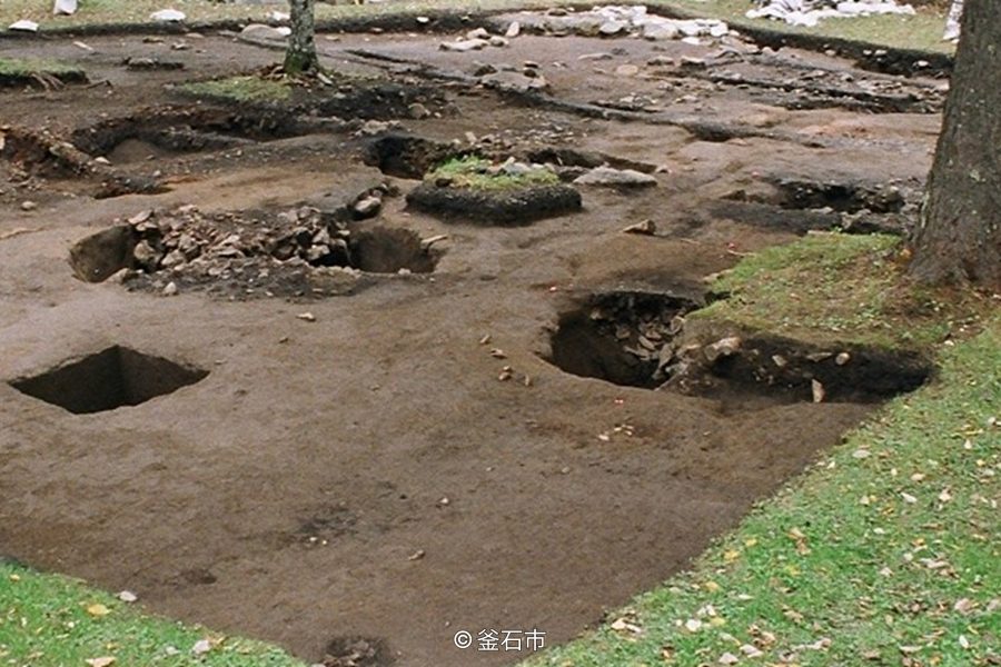 Archaeological excavation site showing underground remains at Hashino Iron Mining and Smelting Site.