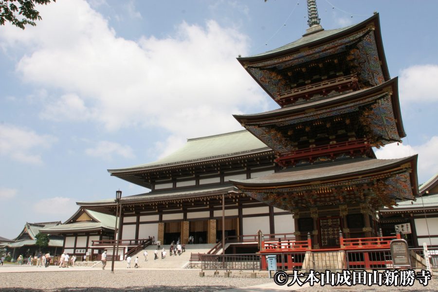 The temple's Three-Story Pagoda (Sanju no To) in the foreground with the large Great Main Hall in the background.