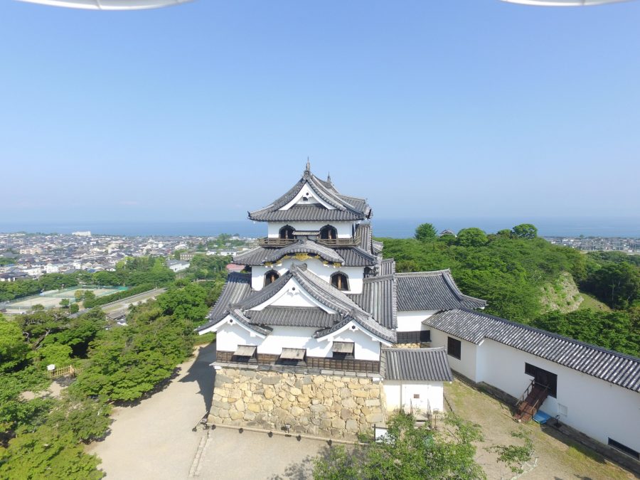 High-angle view of the Hikone Castle keep and surrounding fortifications
