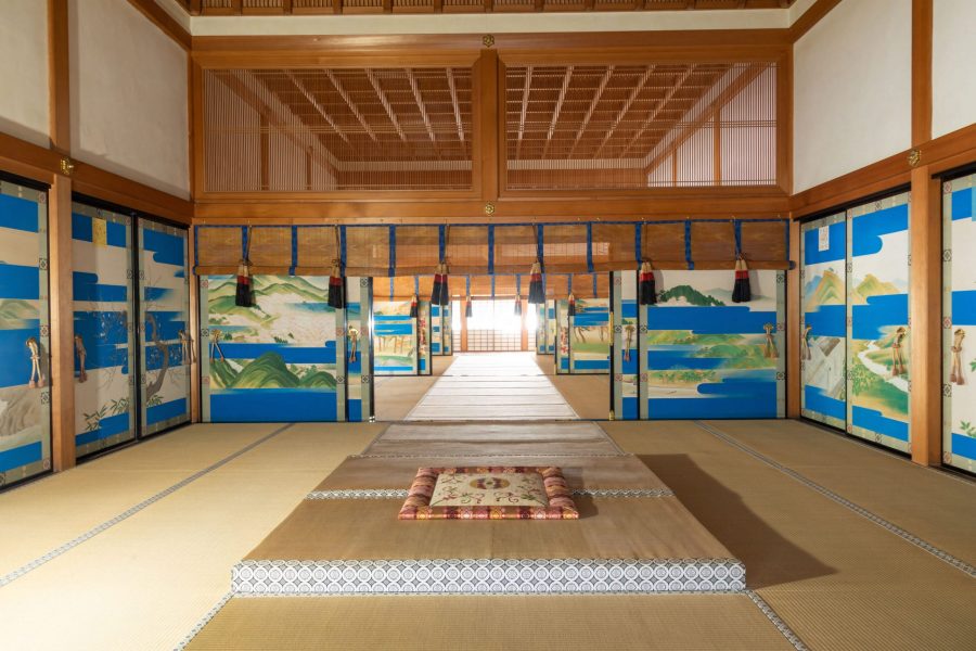 Kogosho (Small Palace) at the Kyoto Imperial Palace. This building was used for ceremonies and meetings with the Shogun and Daimyo. It is famously known as the site of the "Conference of Kogosho" (Kogosho Kaigi) in 1868, which determined the restoration of Imperial rule. The interior features sliding doors (fusuma) painted with landscapes using a distinctive blue mist technique called "Konjo-biki," creating a solemn yet vibrant atmosphere.