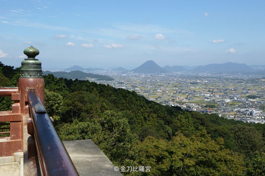 A wide view of the Sanuki Plain and surrounding hills, including Mt. Iino (Sanuki Fuji), seen from the upper level of Kotohira-gu Shrine.
