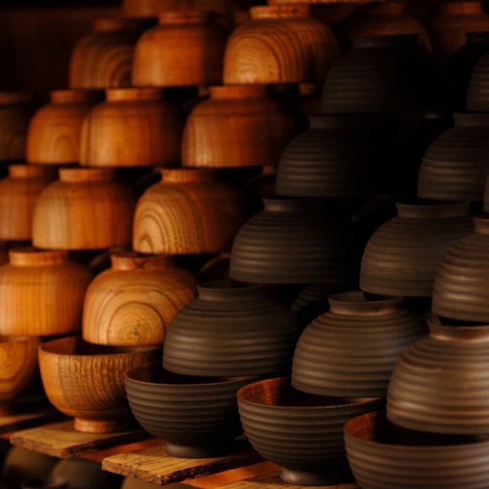 Stacks of pottery in a workshop.