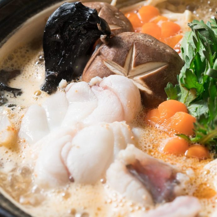 Anko nabe (monkfish hot pot) cooking in a pot.