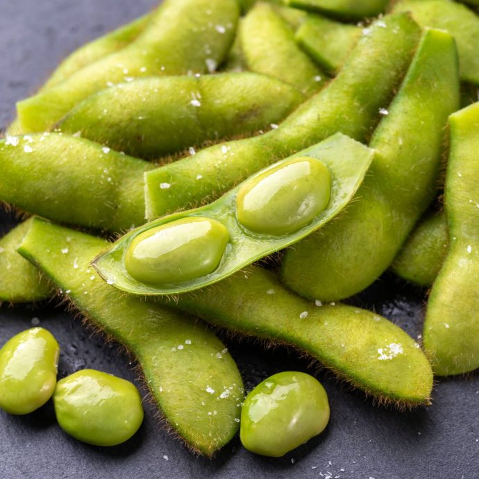 Fresh green edamame pods.