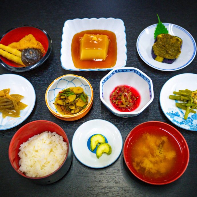 Japanese set meal with rice, soup, and side dishes.