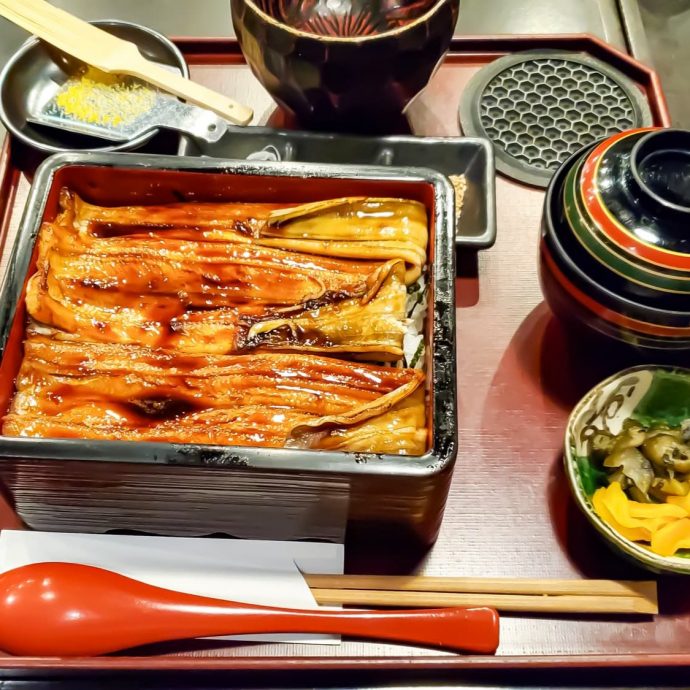 Anago-meshi (conger eel rice) set in a lacquer box.