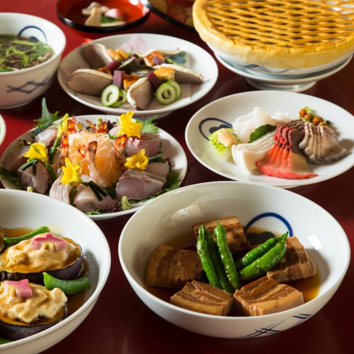 A table set with various dishes of Shippoku cuisine.