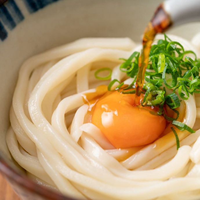 Sanuki udon noodles with a raw egg yolk.