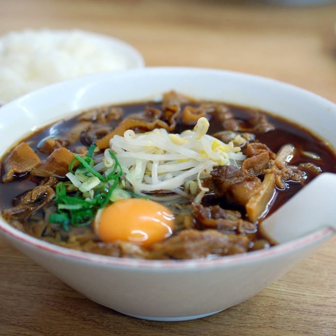 Tokushima ramen with pork and a raw egg yolk.