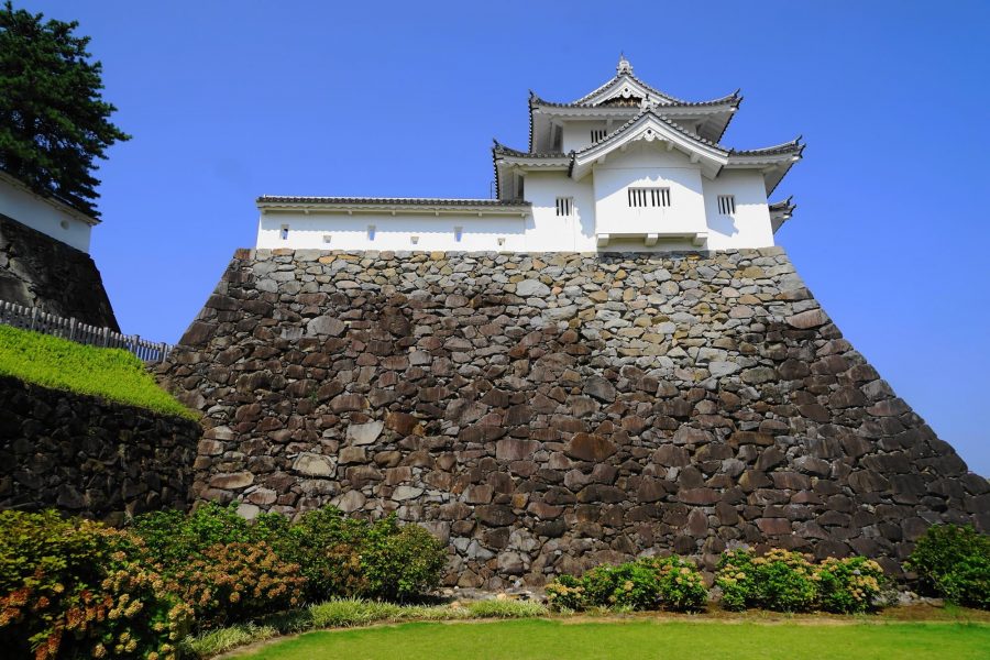 Kofu Castle keep on top of a stone wall.