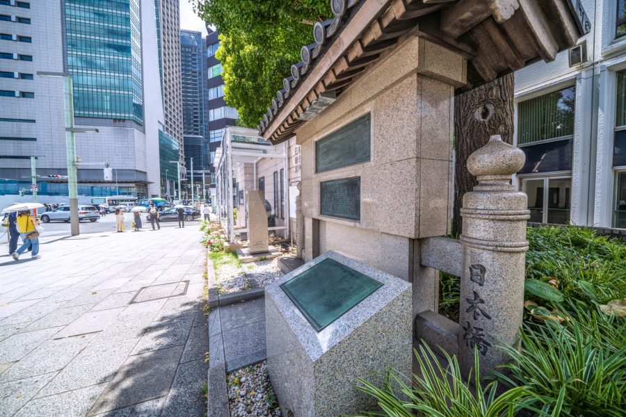 Monument at Nihonbashi bridge commemorating its history.